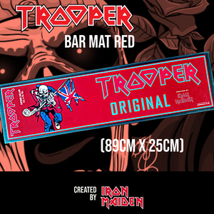 Trooper Premium British Beer red bar mat featuring Iron Maiden’s Eddie mascot with Union Jack flag, created by Robinsons Brewery. Size: 89cm x 25cm.