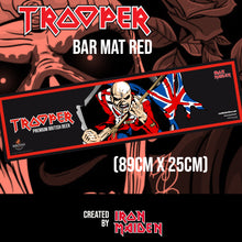 Load the picture into the gallery viewer, Trooper Premium British Beer red bar mat featuring Iron Maiden’s Eddie mascot with Union Jack flag, created by Robinsons Brewery. Size: 89cm x 25cm.
