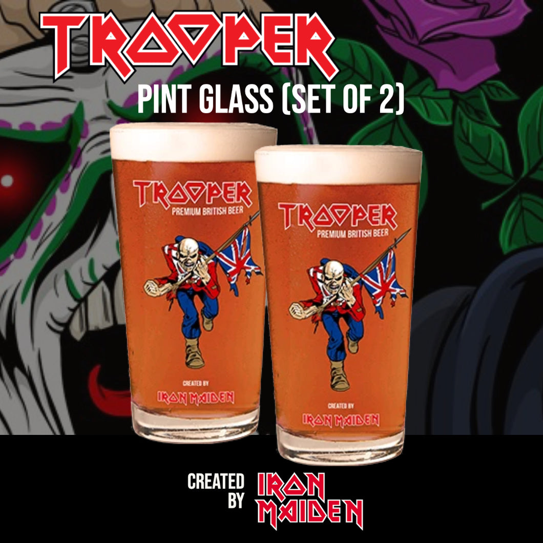 Set of two Iron Maiden Trooper pint glasses featuring Eddie mascot and Union Jack artwork, created by Robinsons Brewery for Trooper Premium British Beer.