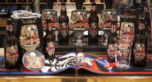 Cargue la imagen en el visor de la galería, Trooper bar mat display with various Trooper beer bottles, pint glass, coasters, and bar mat featuring Iron Maiden’s Eddie design. Created by Iron Maiden, brewed by Robinsons Brewery.
